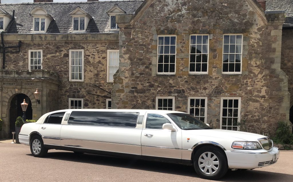 Telford Lincoln Town car beside park